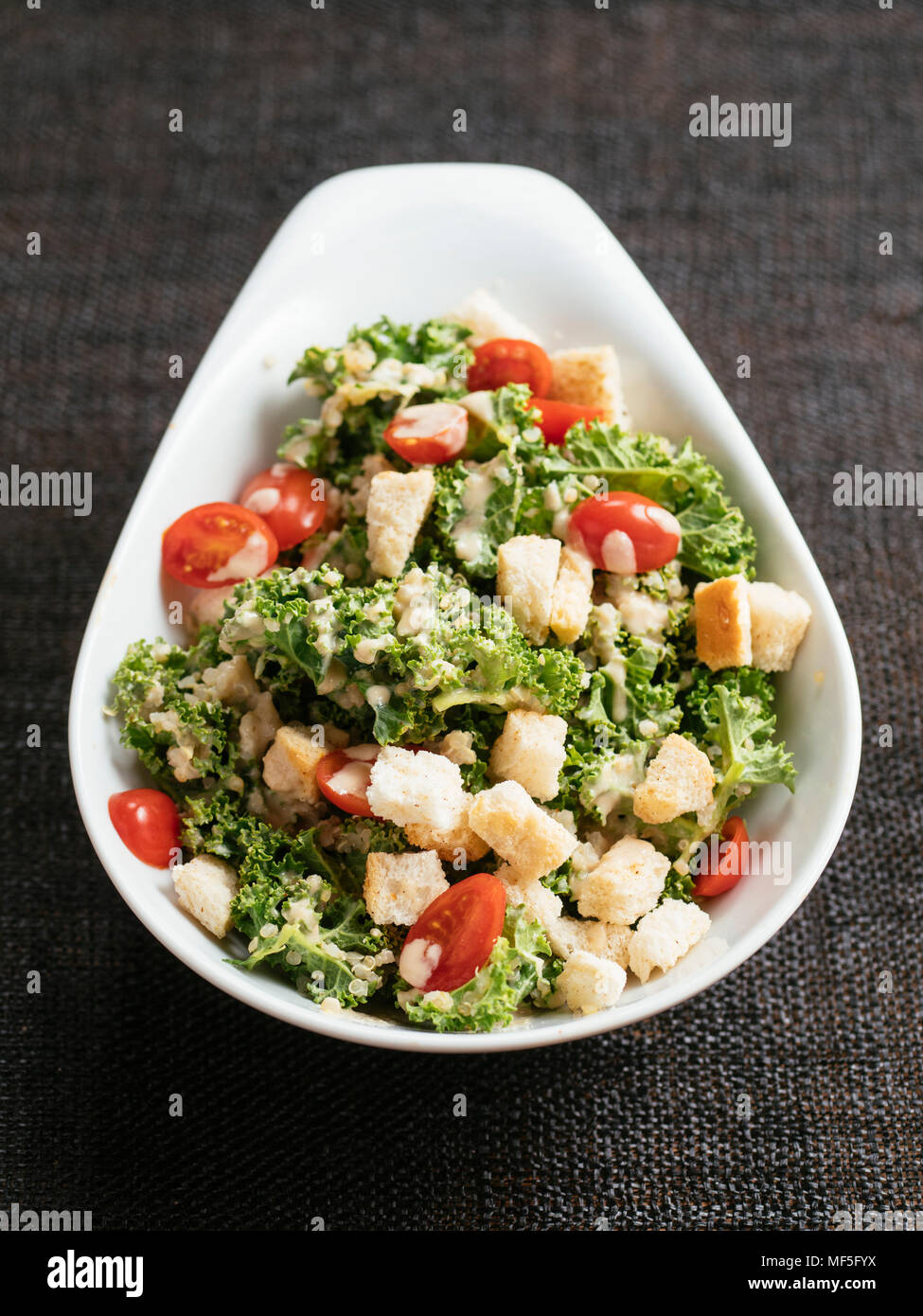 Kale quinoa caesar Salad Stock Photo Alamy