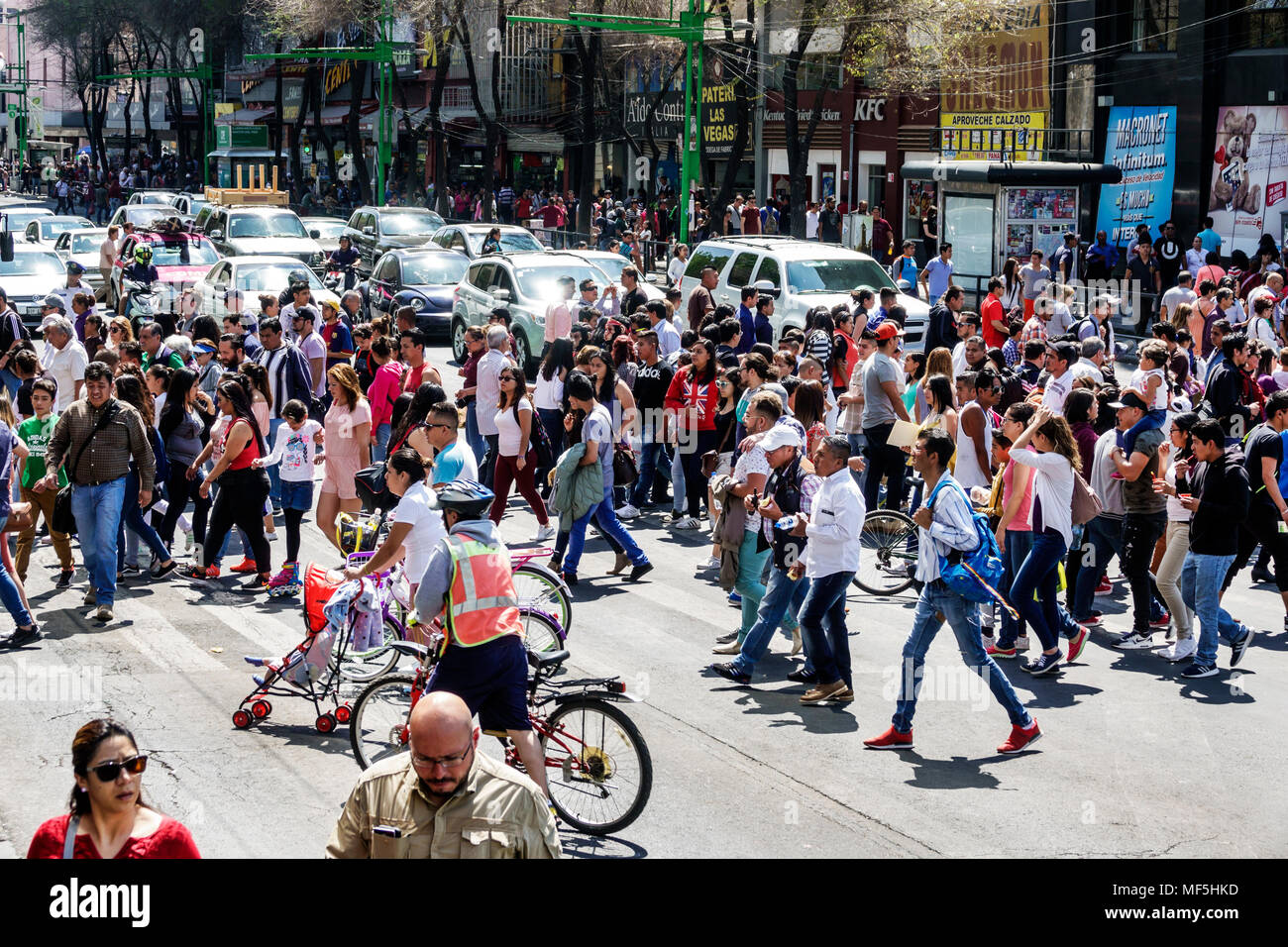 Mexico City,Mexican,Hispanic,historic Center Centre,Eje Central Lazaro Cardena,busy major intersection,crowded pedestrians street crossing,man men mal Stock Photo