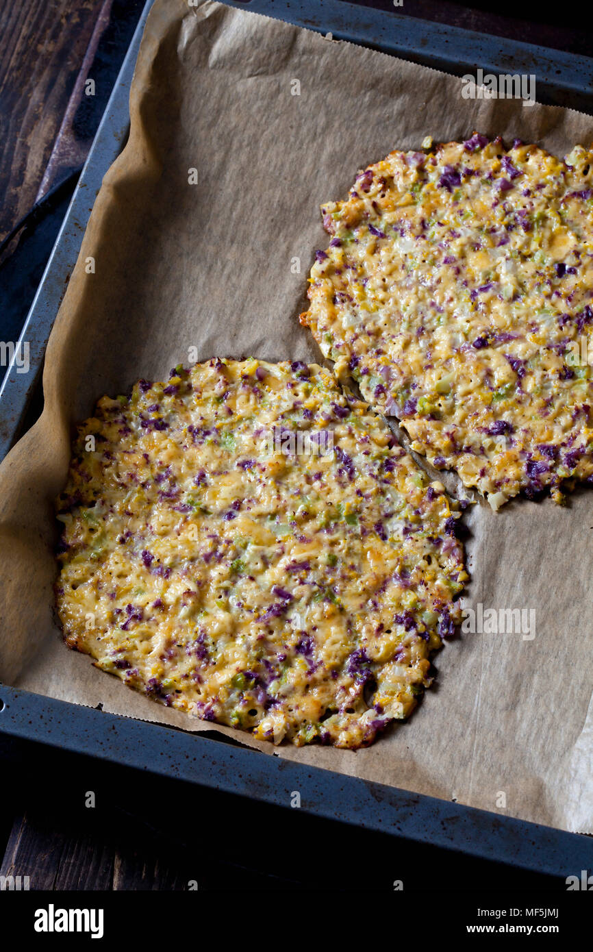 Cauliflower pizza on baking tray Stock Photo