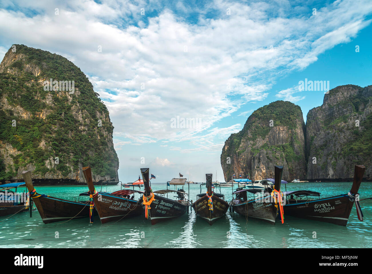 Thailand, Phi Phi Islands, Ko Phi Phi, moored long-tail boats in a row Stock Photo