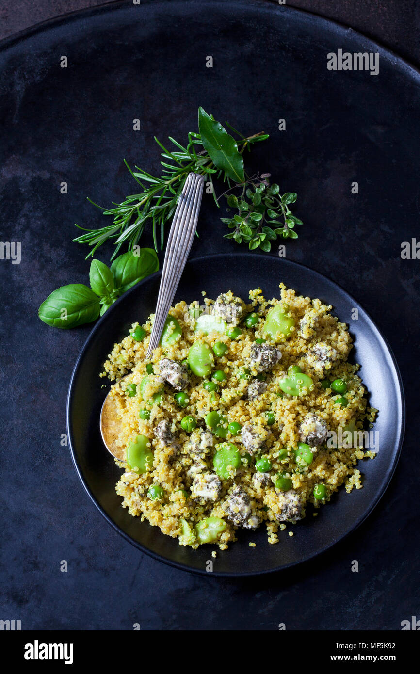 Bowl of quinoa salad with broad beans, peas and feta Stock Photo Alamy