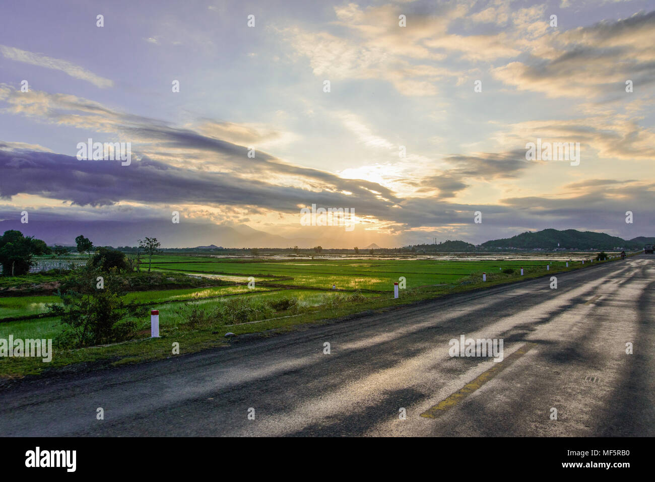 Asphalt road with sunset nature landscape background Stock Photo - Alamy
