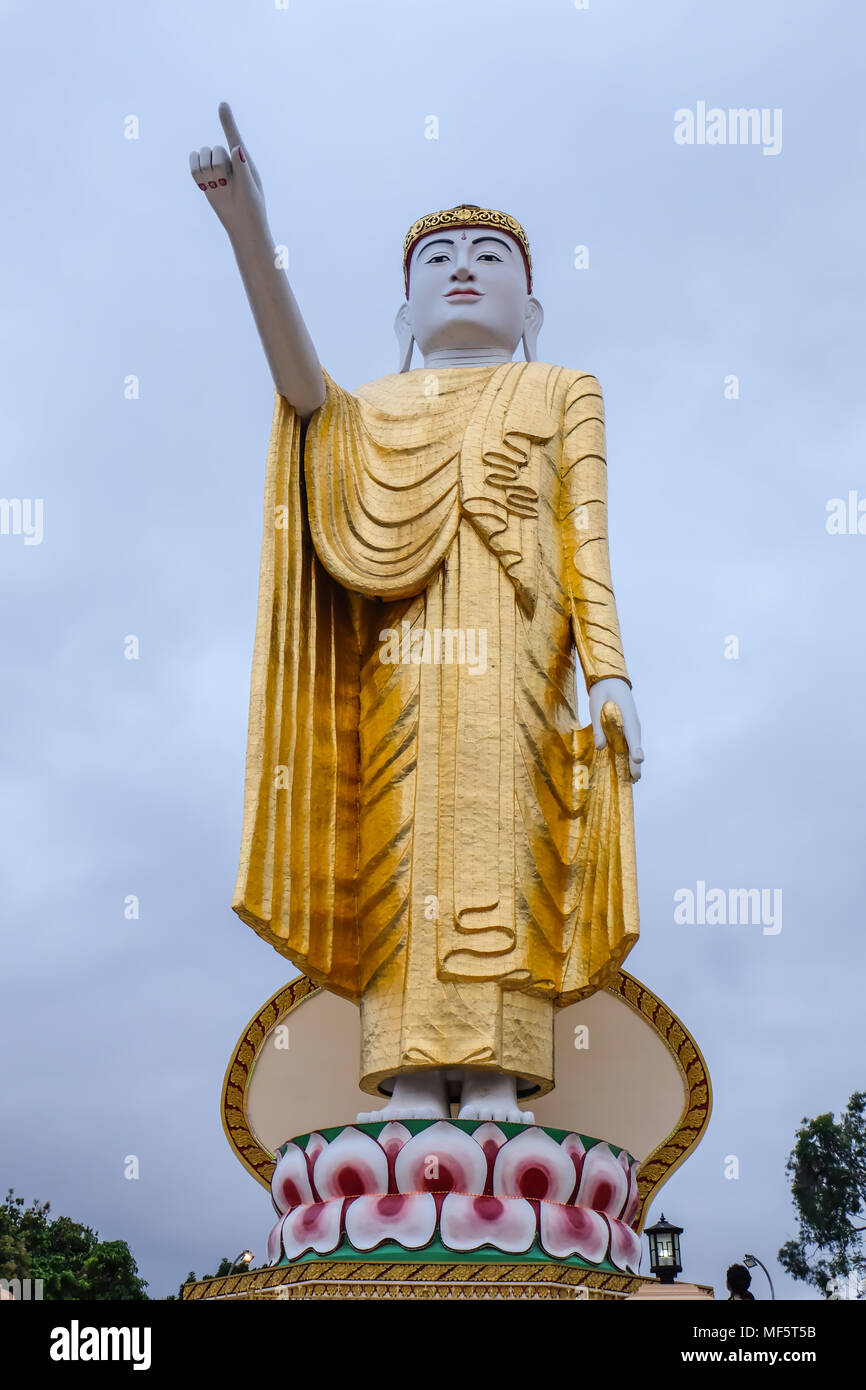 Standing Buddha image at Wat Jom Sak, Kyaing Tong, Myanmar Stock Photo