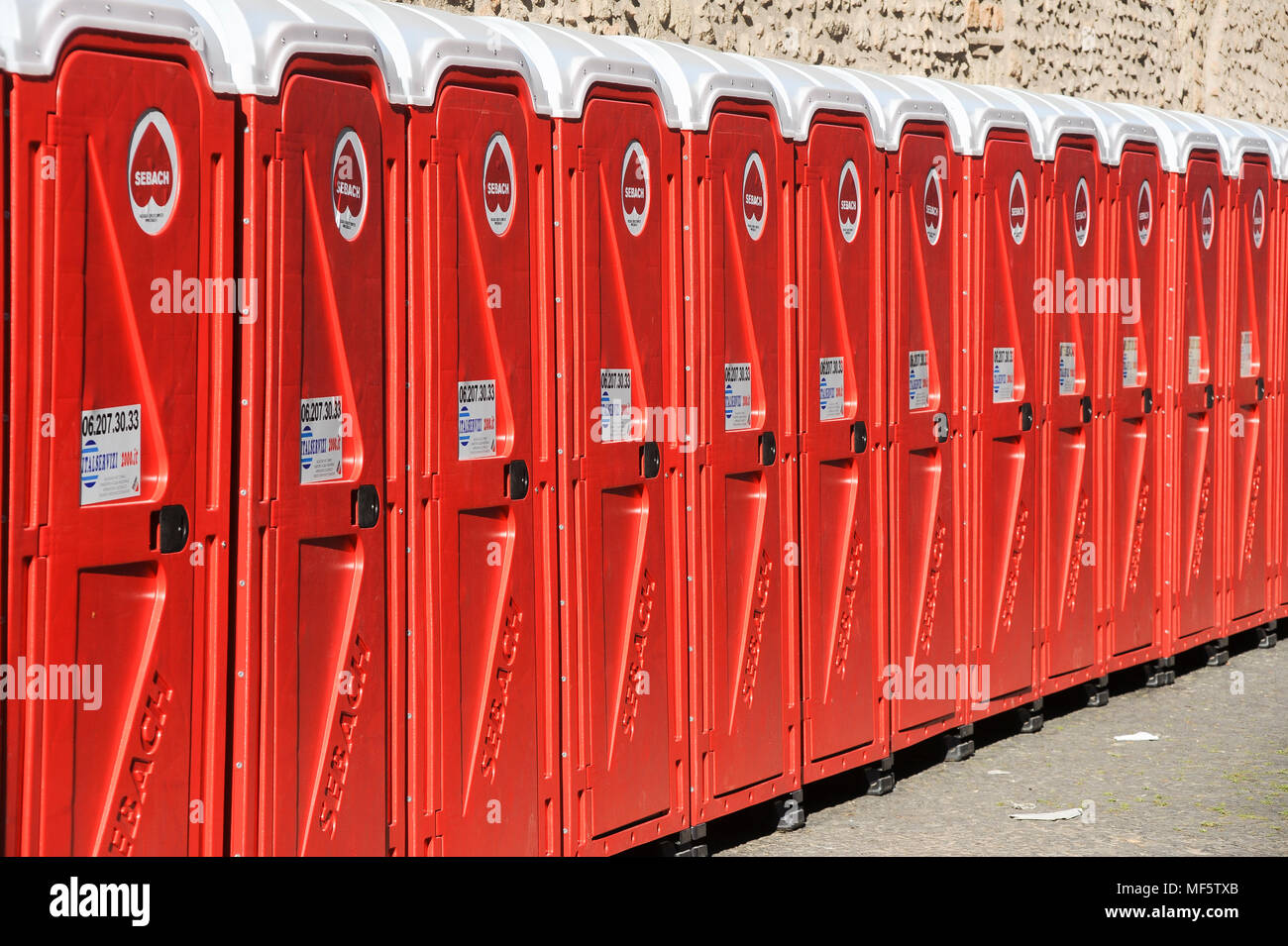 Long row of chemical toilets in Rome, Italy. May 1st 2011 © Wojciech Strozyk / Alamy Stock Photo Stock Photo