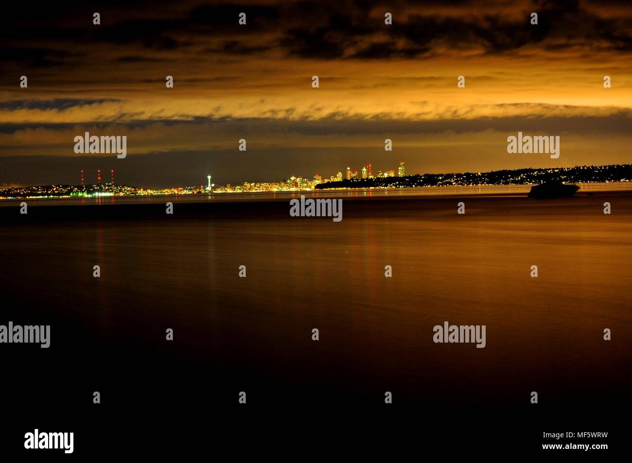 Night Time Seattle skyline and puget sound Stock Photo