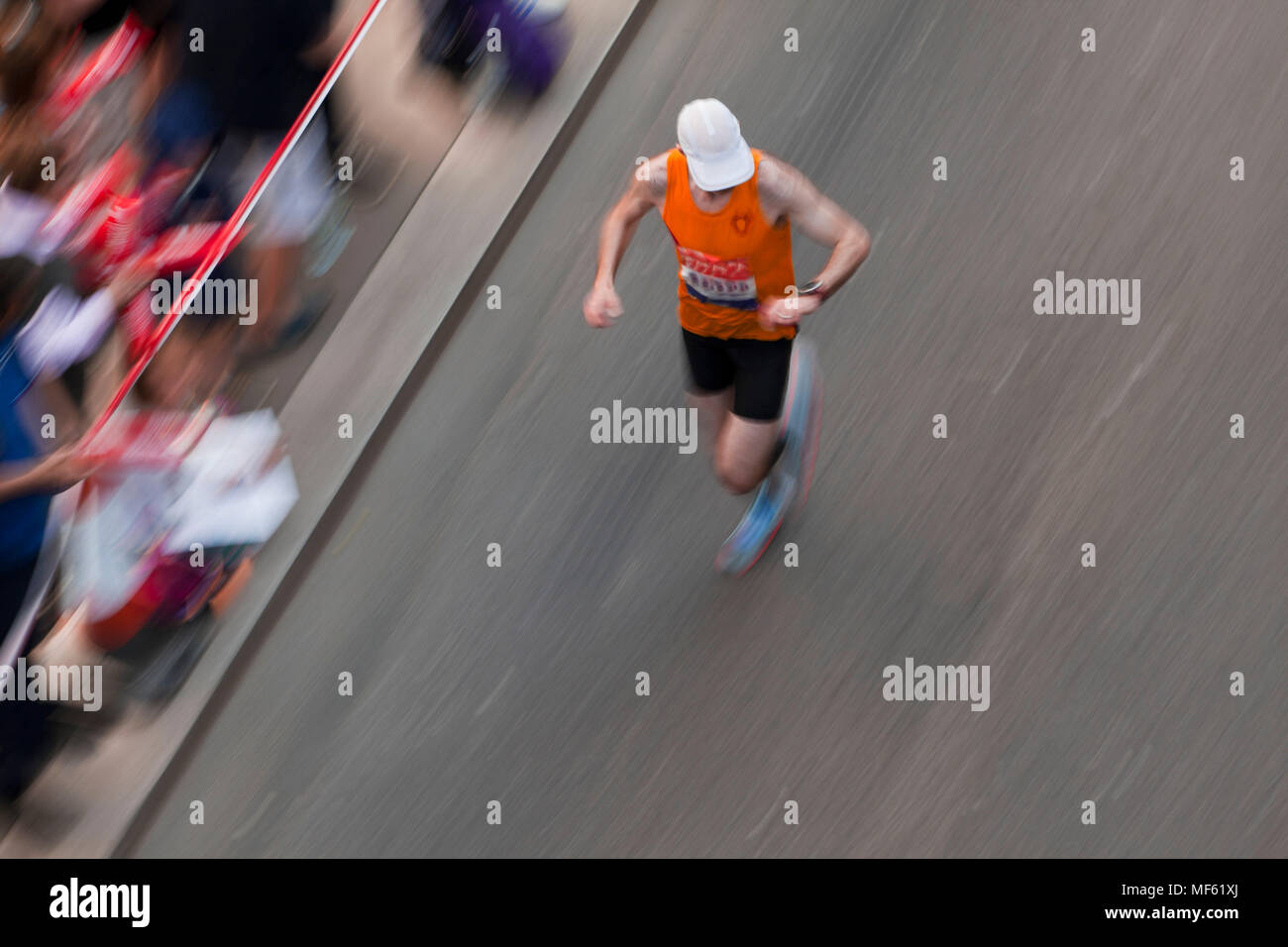 April 22nd, 2018 London, UK  In the soaring temperatures of an early summer athletes run in the streets of London Stock Photo