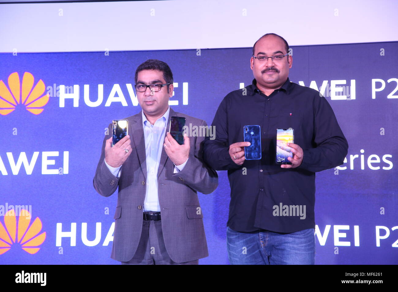 New Delhi, India. 25th May, 2018. P. Sanjeev (R) (Vice-President, Sales, Huawei Business Group) and Suhail Tarique(L) (CMO) unveiling the P20 Lite and the P20 Pro Credit: Jyoti Kapoor/Pacific Press/Alamy Live News Stock Photo