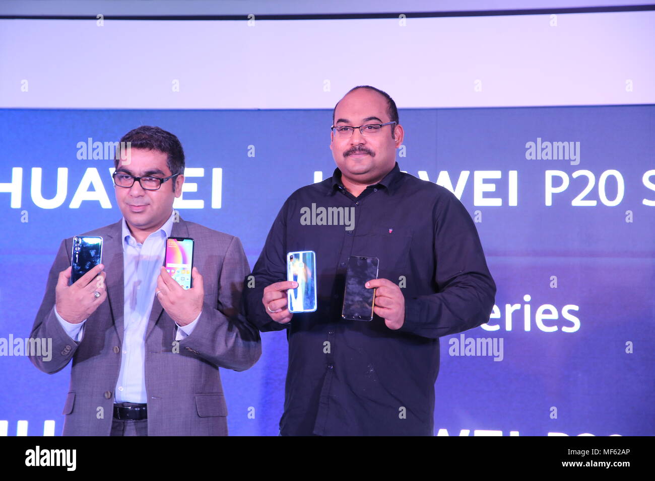 New Delhi, India. 25th May, 2018. P. Sanjeev (R) (Vice-President, Sales, Huawei Business Group) and Suhail Tarique(L) (CMO) unveiling the P20 Lite and the P20 Pro Credit: Jyoti Kapoor/Pacific Press/Alamy Live News Stock Photo