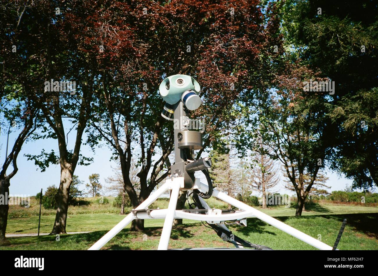 Close-up of automated 3d camera system atop a street view vehicle at ...