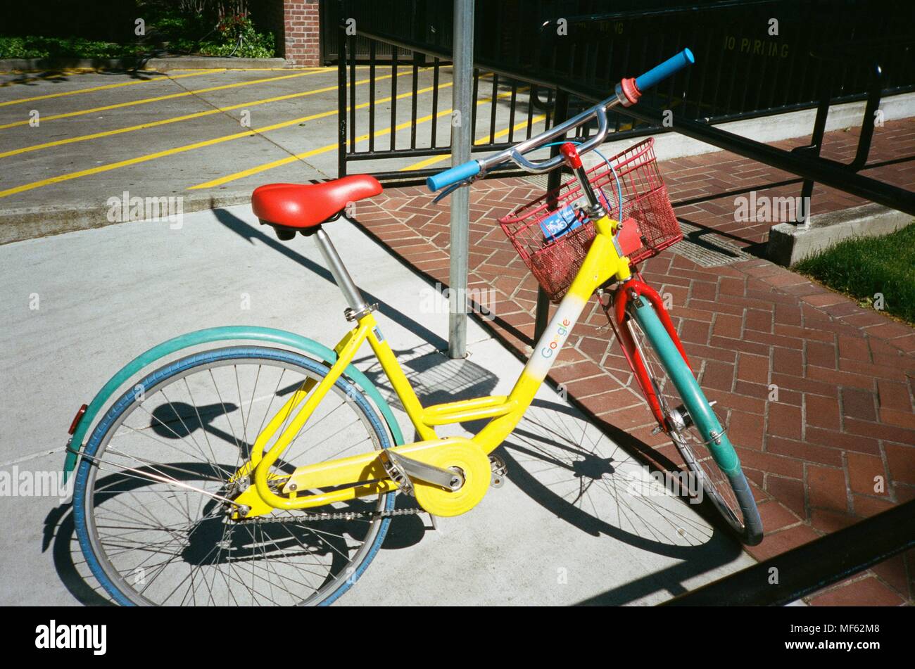 Google Bike parked near a campus building at the Googleplex, the Silicon Valley headquarters of search engine and technology company Google Inc in Mountain View, California, April 14, 2018. () Stock Photo