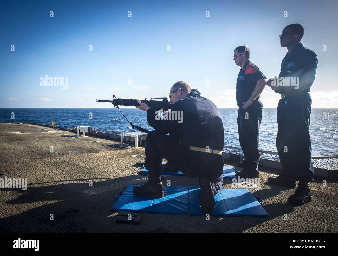 170109-N-BL607-145 ATLATIC OCEAN (Jan. 9, 2017) Sailors assigned to the guided-missile cruiser USS Monterey (CG 61) fire the M-16 rifle during a small arms qualification, January 9, 2017. Monterey, deployed as part of the Eisenhower Carrier Strike Group, is conducting naval operations in the U.S. 6th Fleet area of operations in support of U.S. national security interests in Europe. (U.S. Navy photo by Mass Communication Specialist 2nd Class William Jenkins). () Stock Photo