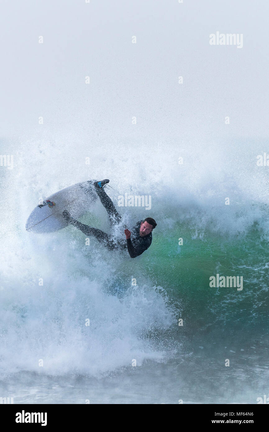Spectacular surfing action at Fistral Beach in Newquay Cornwall. Stock Photo