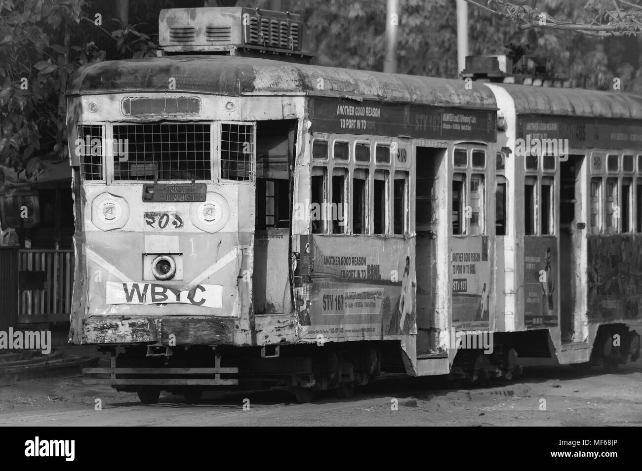 Kolkata, West Bengal, India - March 11, 2018 : The heritage of Kolkata, trams waiting for passengers on a Sunday morning at a tram station in Kolkata, Stock Photo