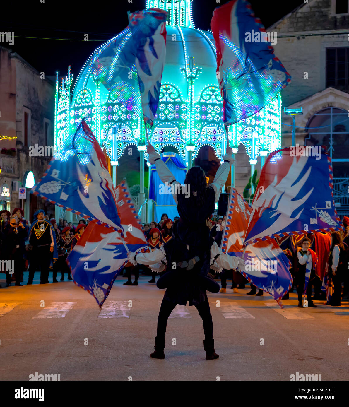 Modugno - ITALY. March 9, 2018: performance of a group of flag-wavers during the evening parade of the patronal feast Stock Photo