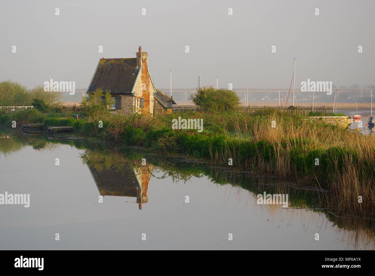Topsham Lock Keepers Cottage On A Spring Morning By The Tranquil