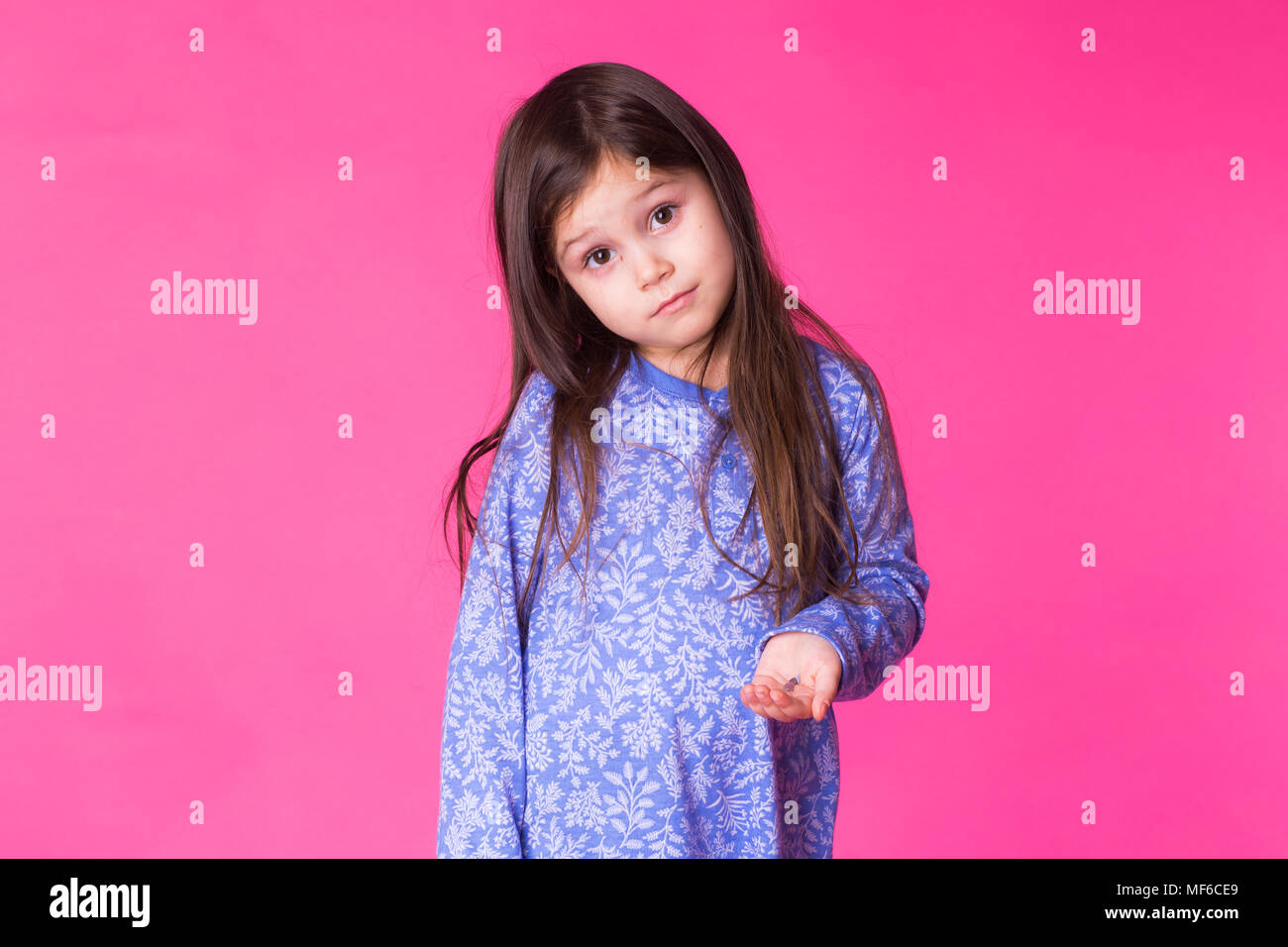 Portrait of adorable little girl isolated on a pink background Stock ...