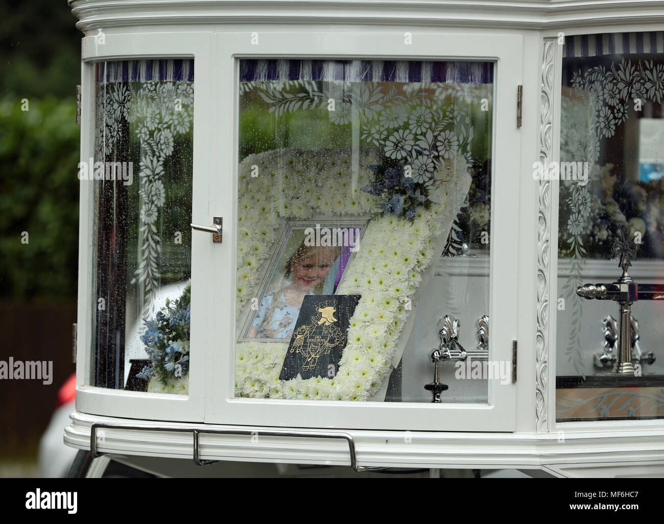 A hearse carrying the coffin of eight-year-old stabbing victim Mylee Billingham arrives at St James' Church, Walsall, for her funeral. Stock Photo