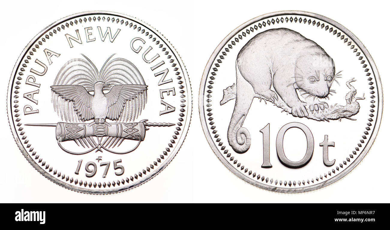 10 Toea coin from Papua New Guinea. 1975. National coat of arms, Bird of Paradise and Cuscus (possum) Stock Photo
