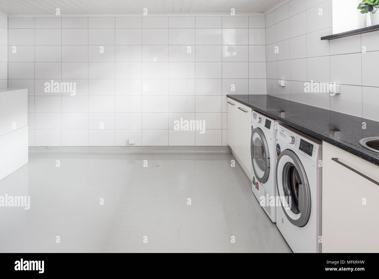 White Basement Laundry Room Stock Photo Alamy