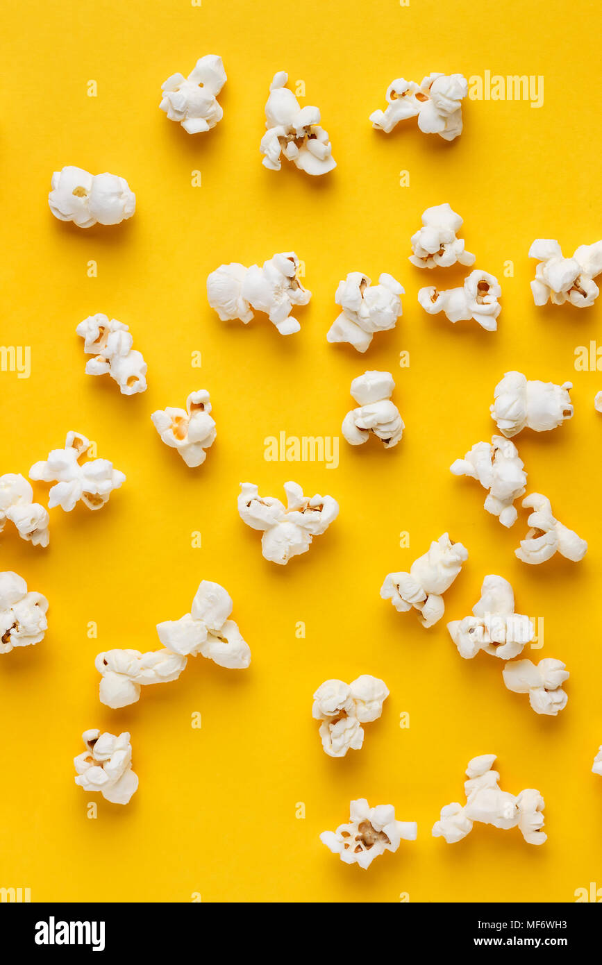 Download Popcorn On A Yellow Background Vertical Image Top View Stock Photo Alamy PSD Mockup Templates