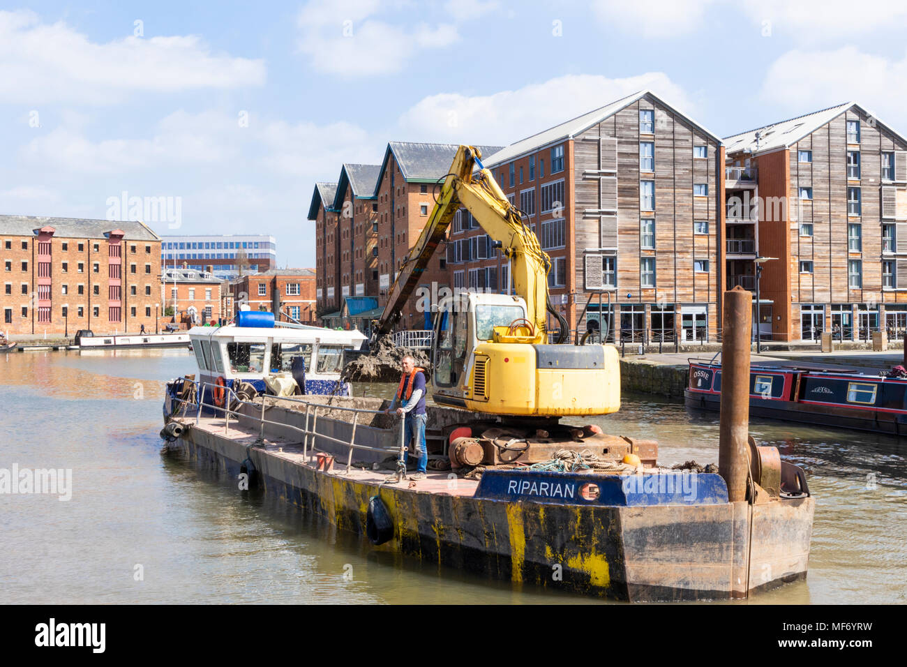 The dredger Riparian dredging Gloucester Docks, Gloucester UK Stock Photo