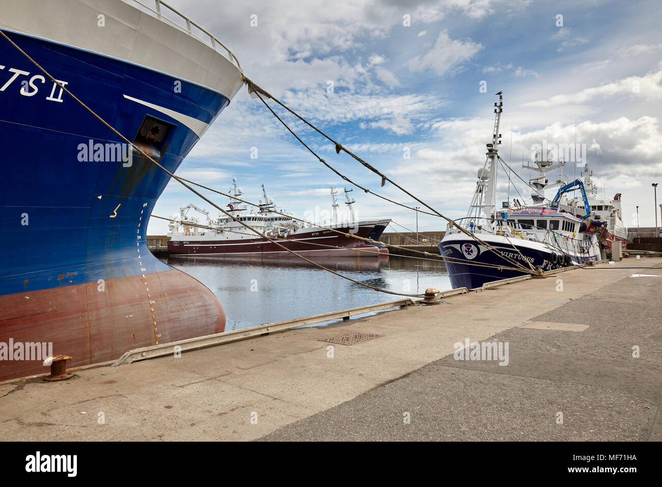 Virtuous FR253 trawler and Resolute BF50 moored at Fraserburgh Harbour Stock Photo