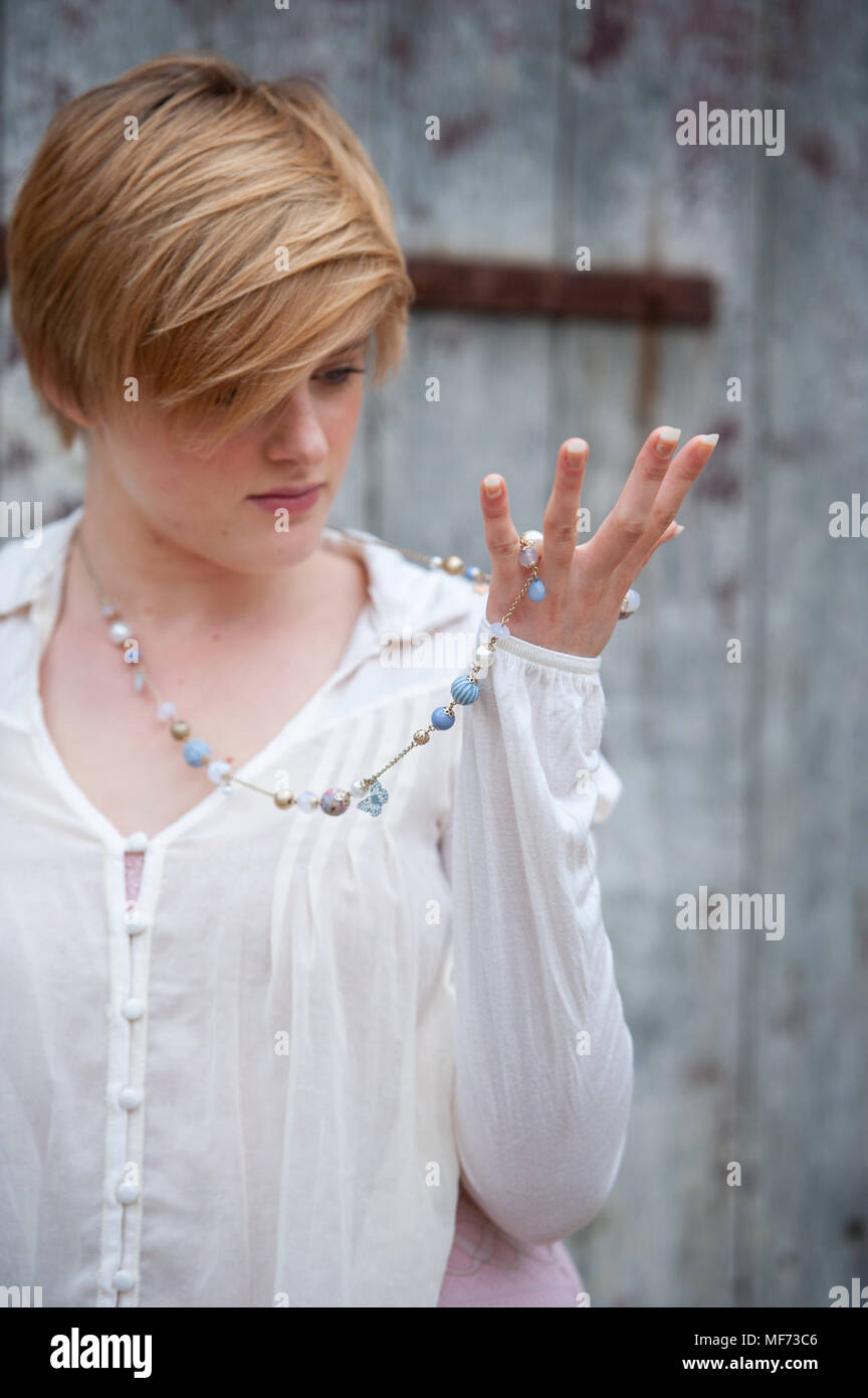 Young Blonde Short Haired Model With Fringe Modelling White