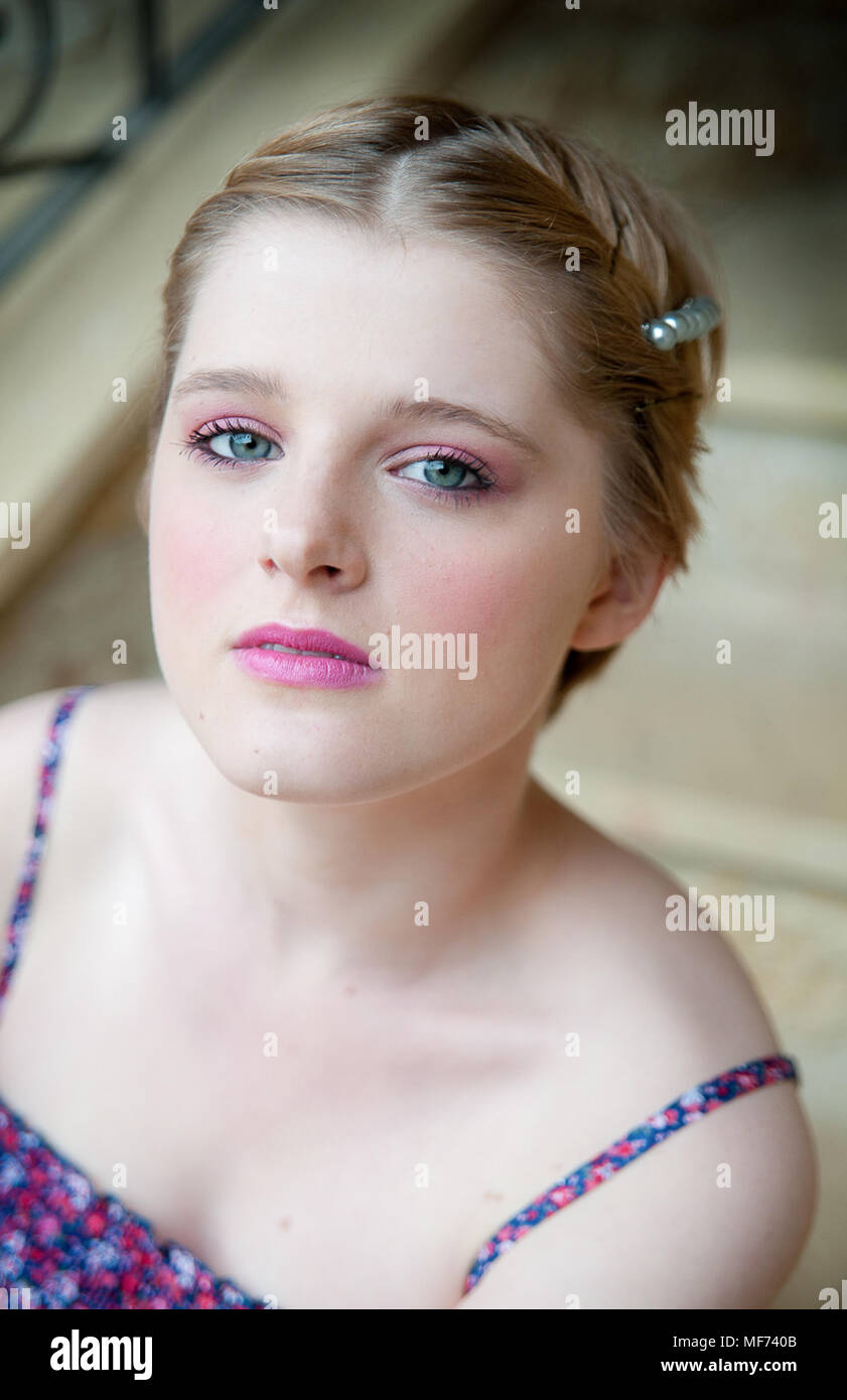 Young Blond With Short Hair Plaited Back Modelling Pink Themed