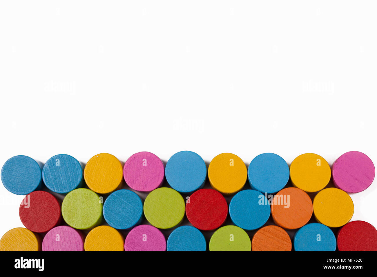 Colored wooden circles on a white background, isolate Stock Photo