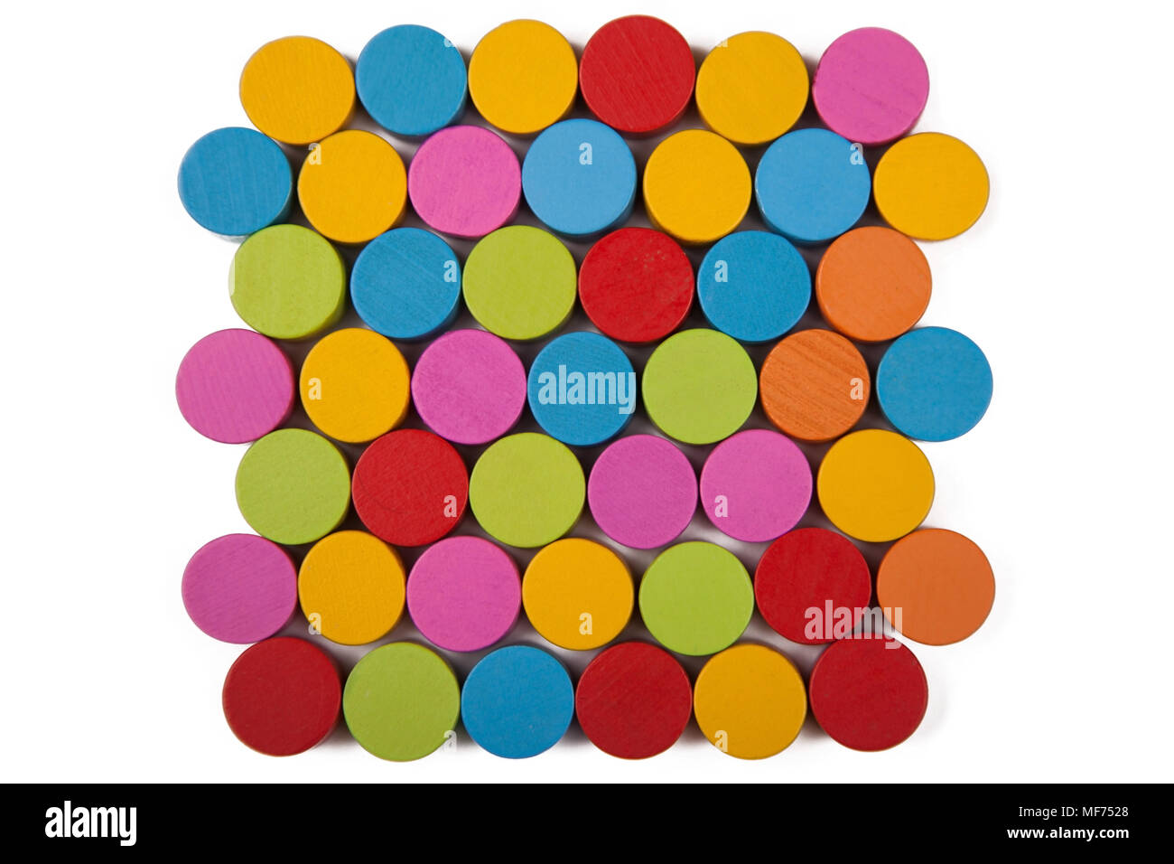 Colored wooden circles on a white background, isolate Stock Photo