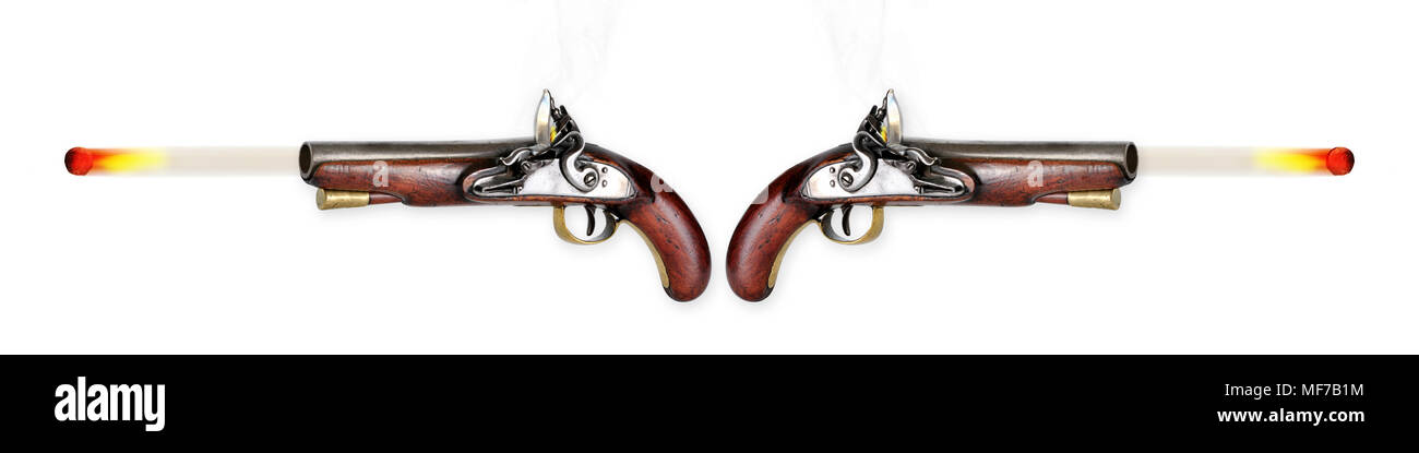 Two antique flintlock pistols firing musketballs. Stock Photo
