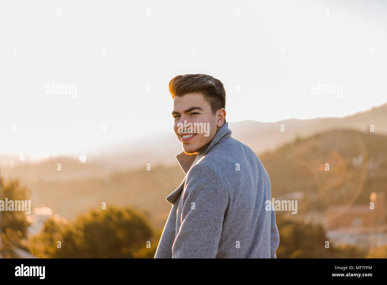 One young man turning head hi-res stock photography and images - Alamy