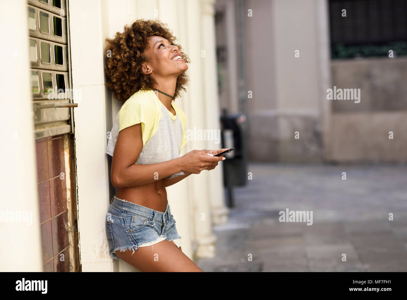 Touching clothes hires stock photography and images Alamy