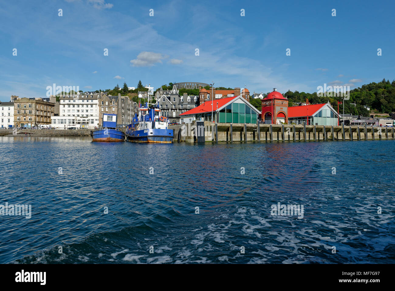 United Kingdom, Scotland, Argyll and Bute, Oban, harbour and McCaig’s Tower Stock Photo