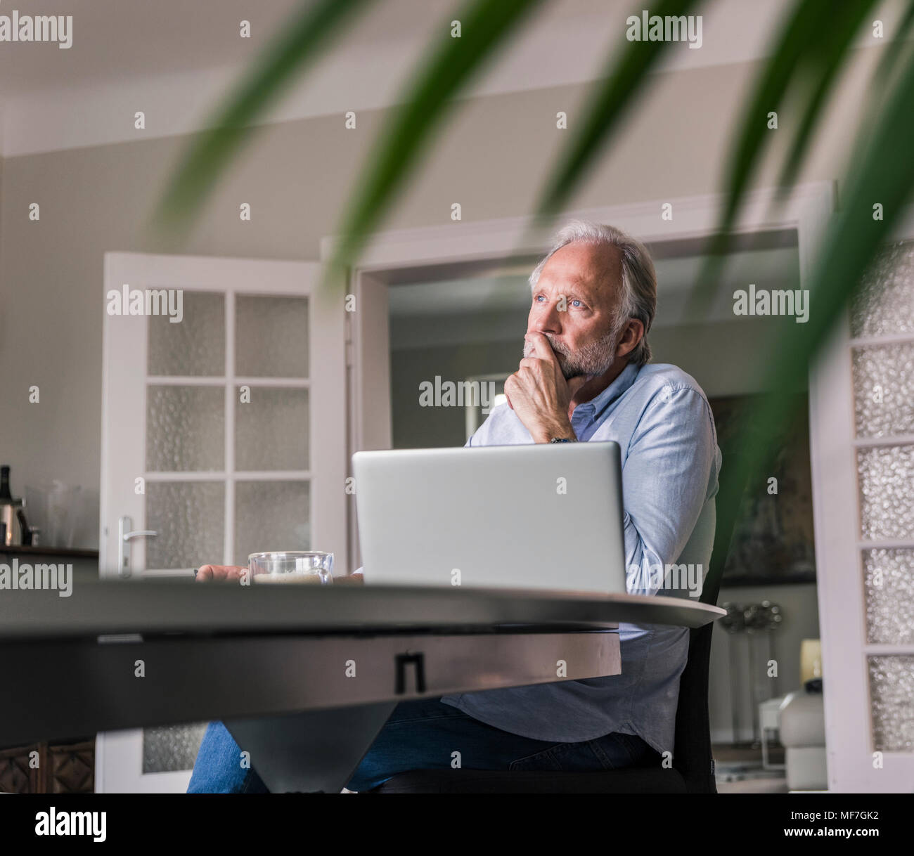Mature business man laptop alone hi-res stock photography and images ...