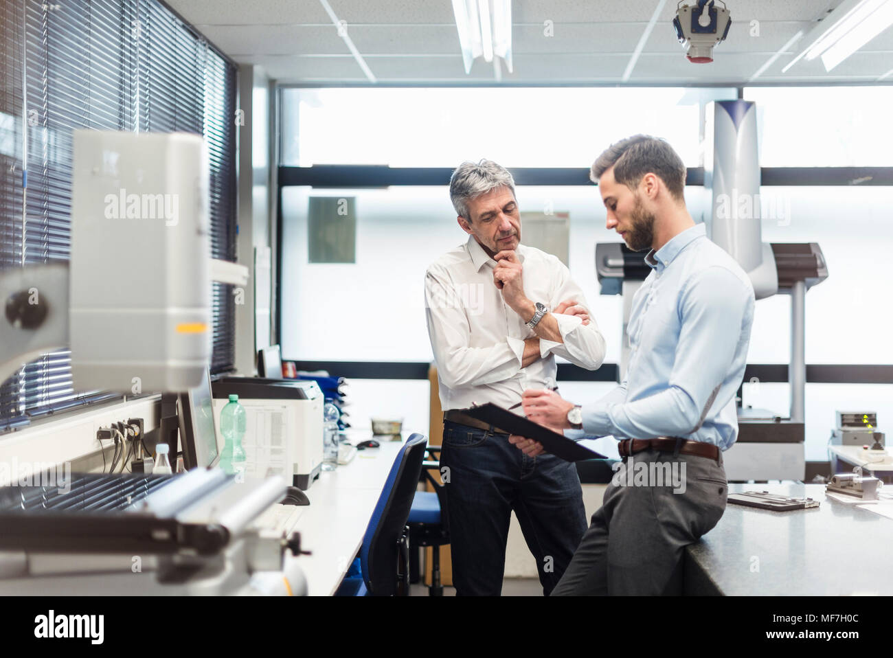 Businessmen during meeting Stock Photo