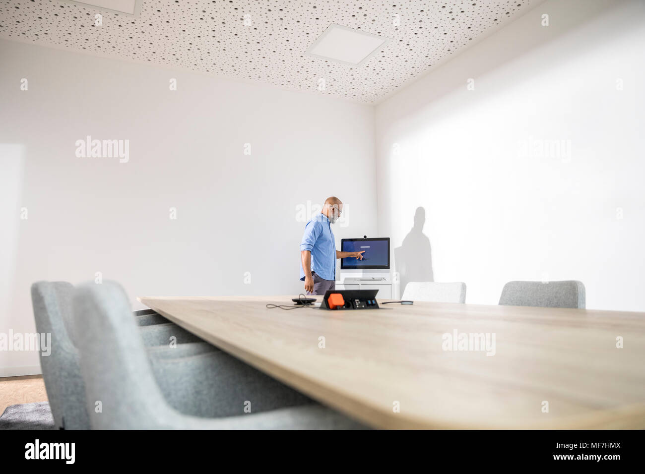 Businessman in conference room preparing a presentation Stock Photo