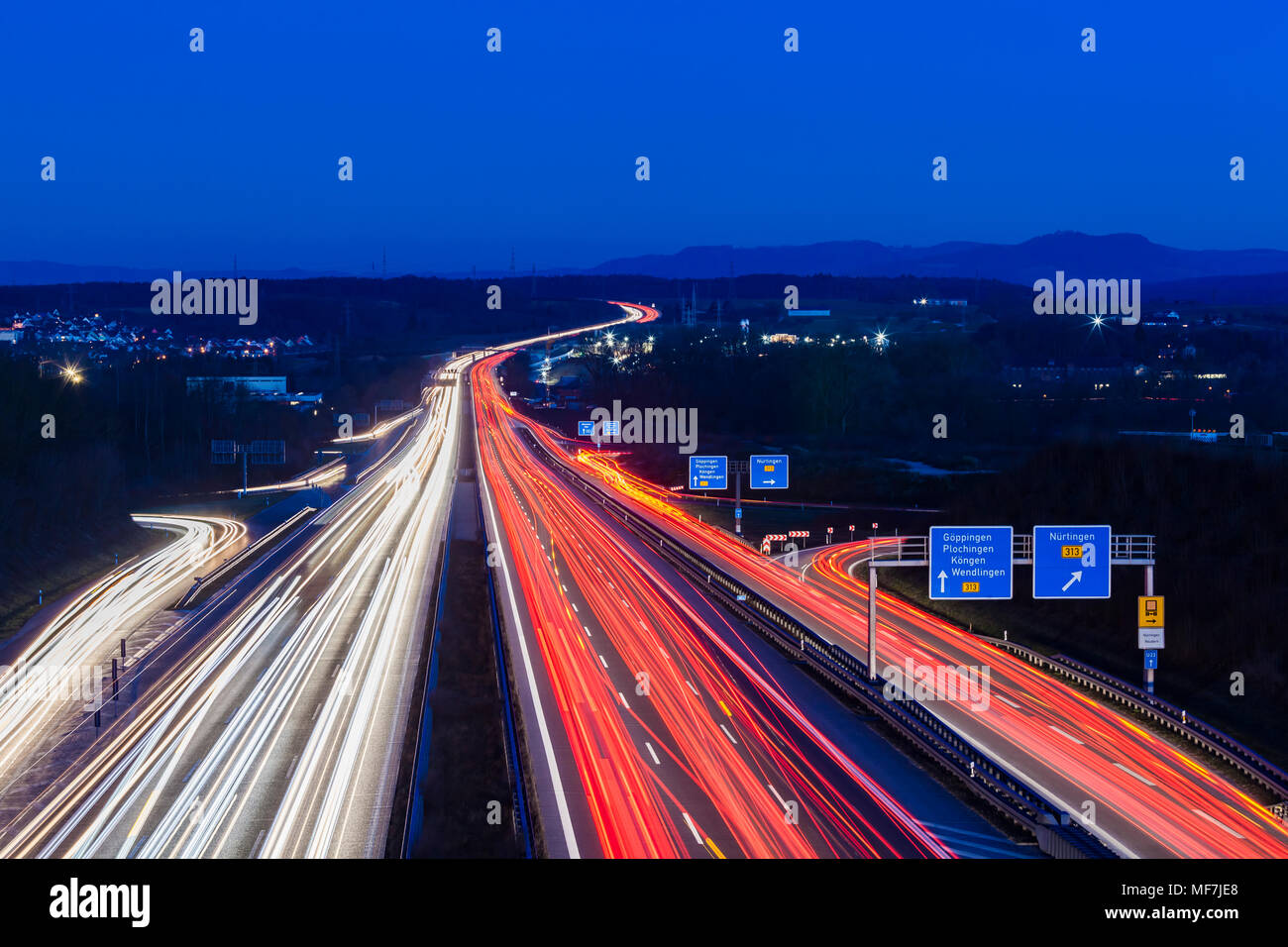 Germany, Baden-Wuerttemberg, Autobahn A8 near Wendlingen in the evening, light trails Stock Photo