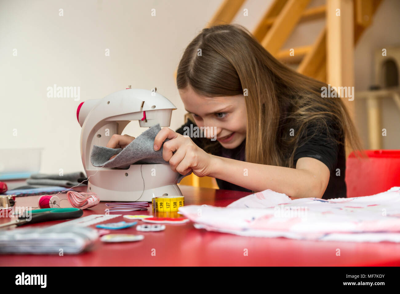 renoirs-young-girl-sewing