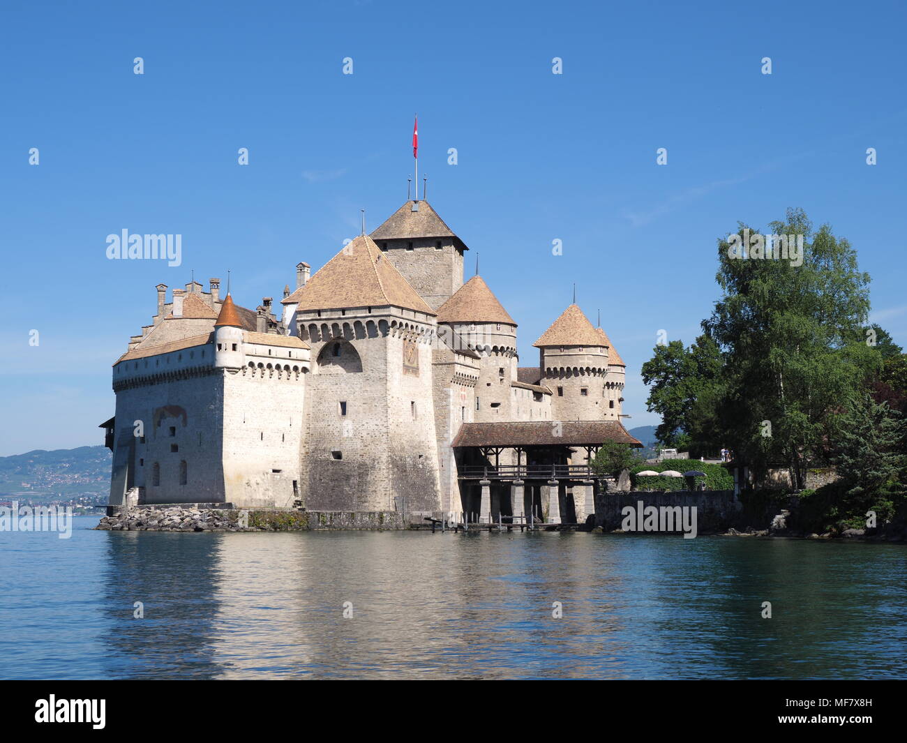 MONTREUX, SWITZERLAND on JULY 2017: Medieval Chateau de Chillon castle scenery at Lake Geneva in european city, Canton of Vaud, landscapes of alpine L Stock Photo