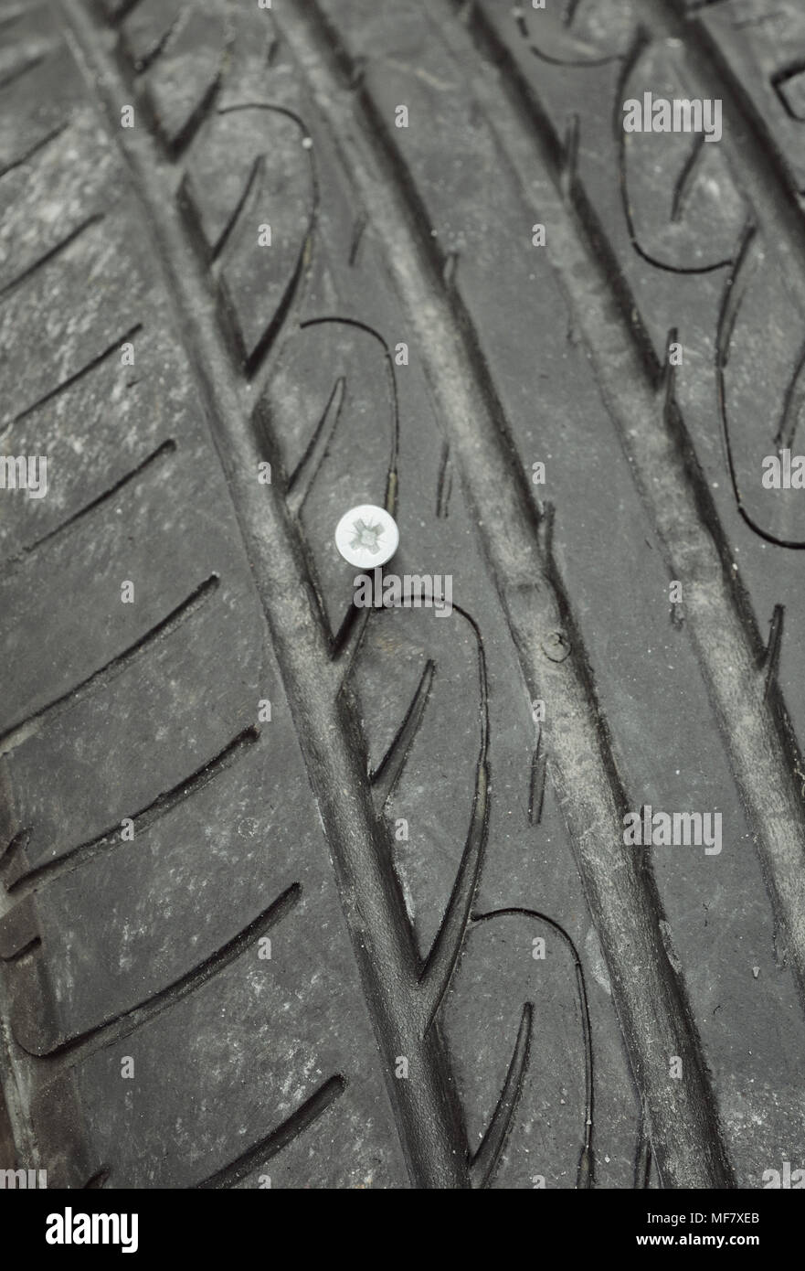 Screw in car tyre Stock Photo Alamy
