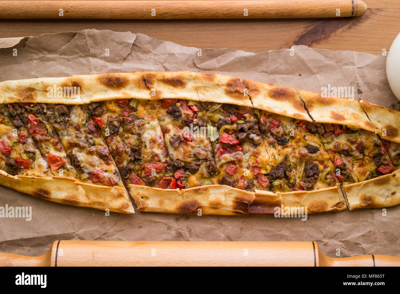 Turkish pide with cheese and cubed meat / kusbasili kasarli pide Stock