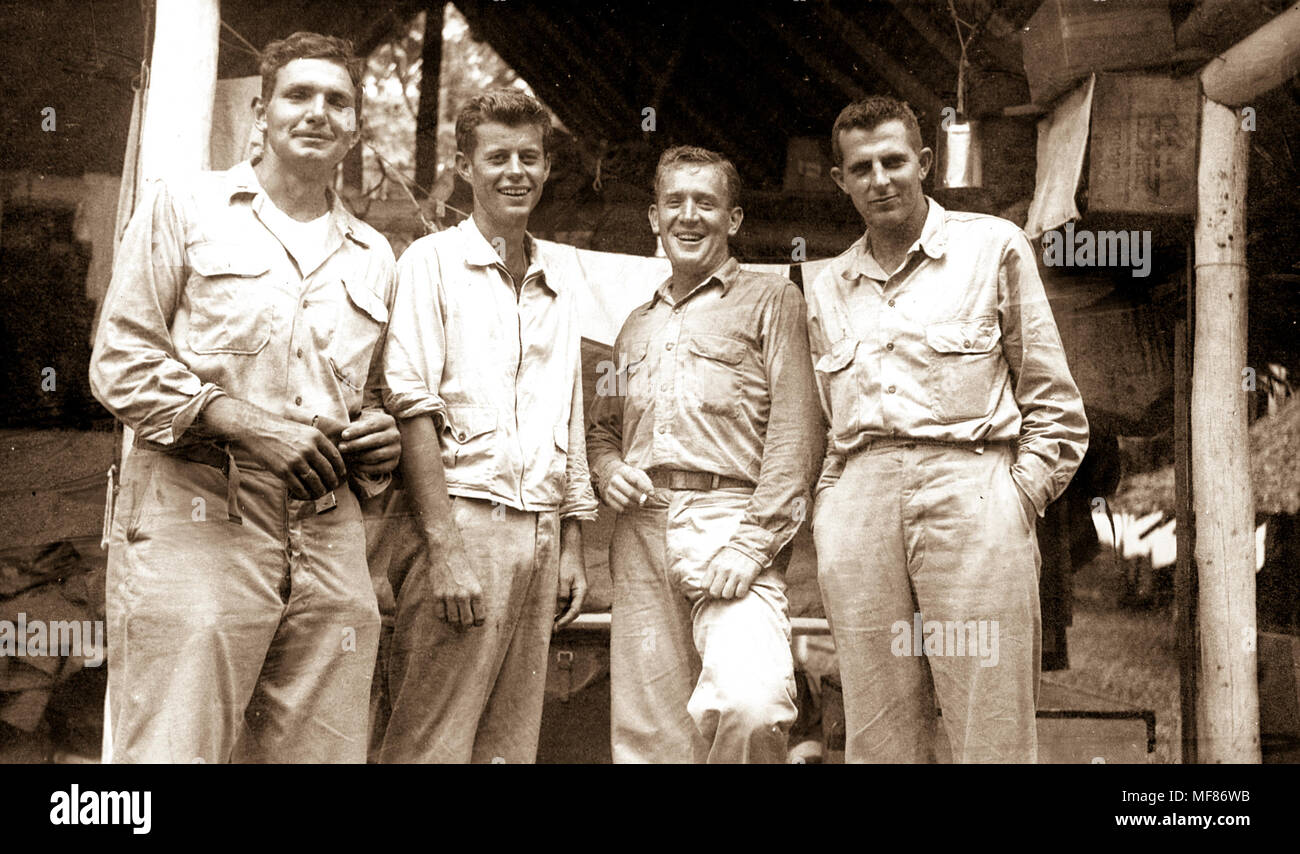 PC 97  Tulagi, Solomon Islands, 1943 L-R: George 'Barney' Ross, John F. Kennedy, Paul 'Red' Fay, James 'Jim' Reed. Please credit 'John Fitzgerald Kennedy Library, Boston'. Stock Photo