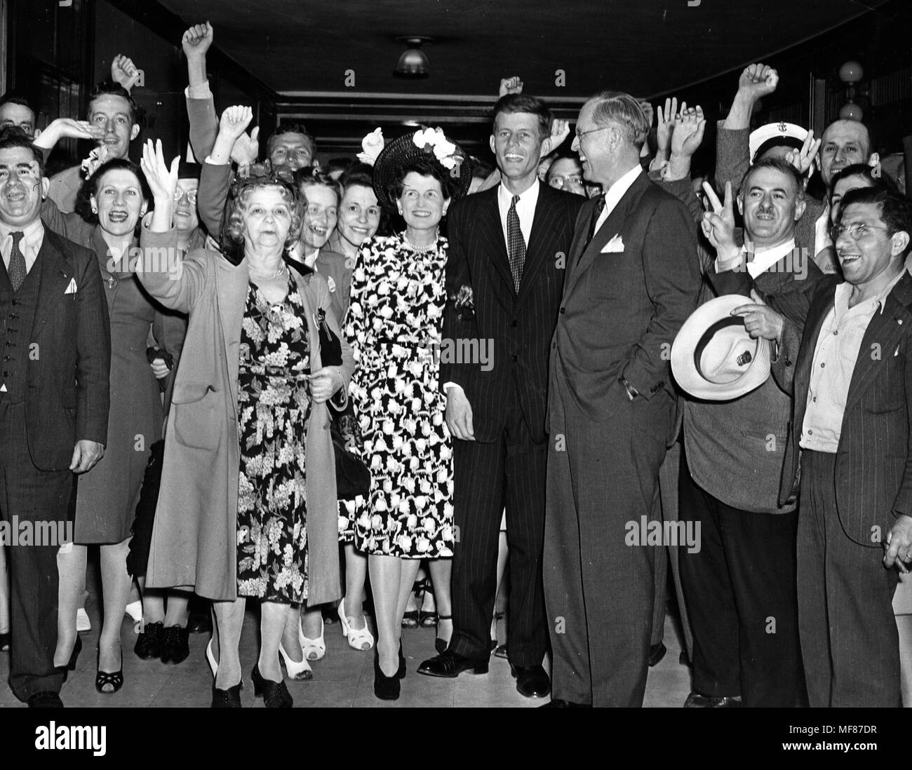 PC363   18 June 1946  Boston Surrounded by supporters, including his mother Rose Fitzgerald Kennedy and his father Joseph P. Kennedy, John F. Kennedy celebrates his Democratic nomination for Massachusetts' 11th Congressional District, Boston. John F. Kennedy wins the Democratic nomination for Massachusetts' 11th Congressional District. Photograph in the John Fitzgerald Kennedy Library, Boston. Stock Photo