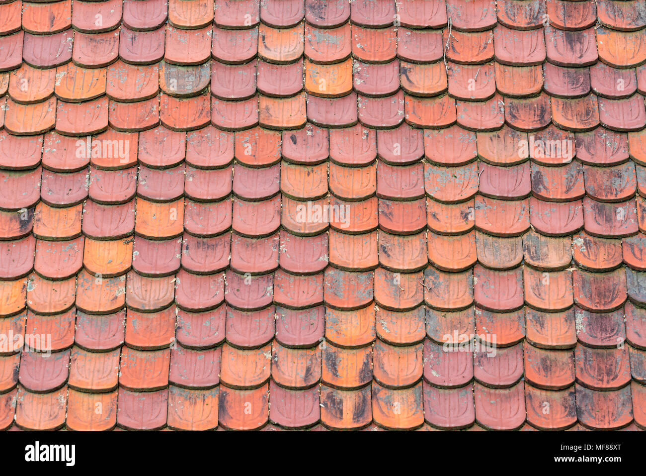 Terracotta clay roof shingles background Stock Photo