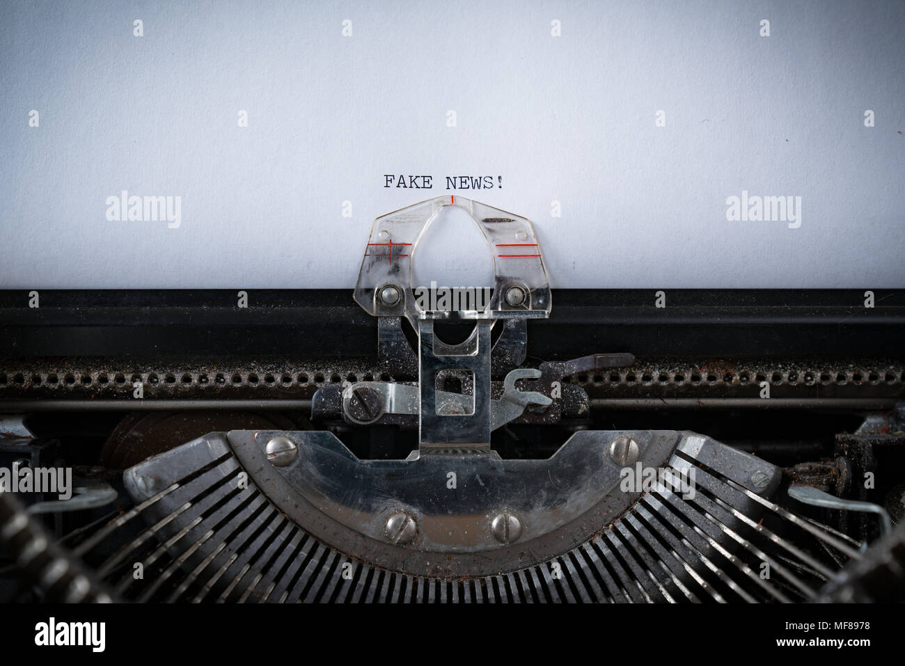 The phrase Fake News typed on an old Typewriter Stock Photo