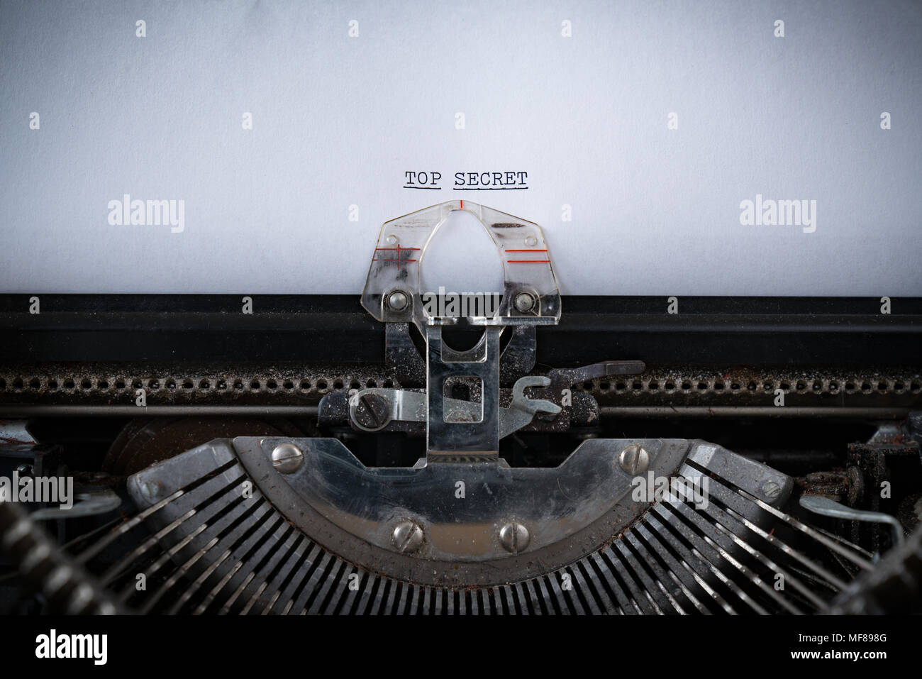The phrase Top Secret typed on an old Typewriter Stock Photo