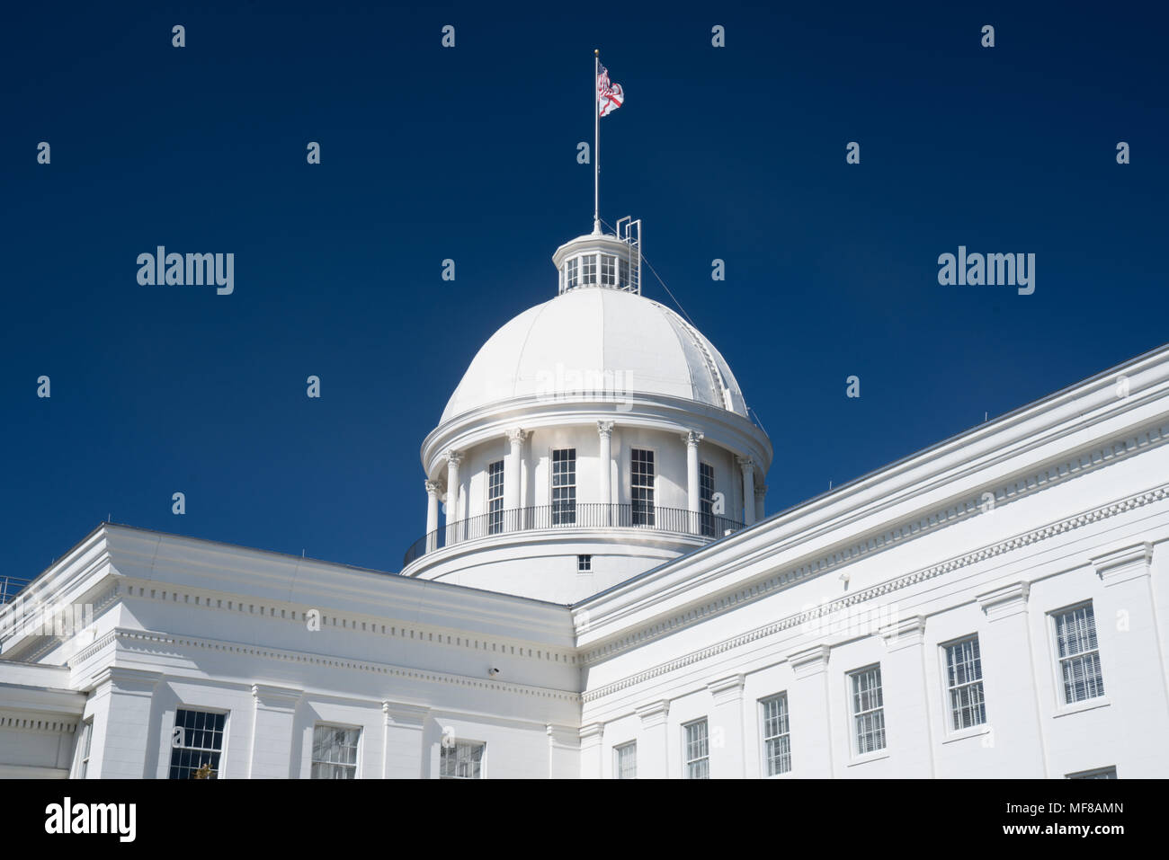 State Flag on the dome of the Alabama State Capitol Building in Montgomery, Alabama Stock Photo