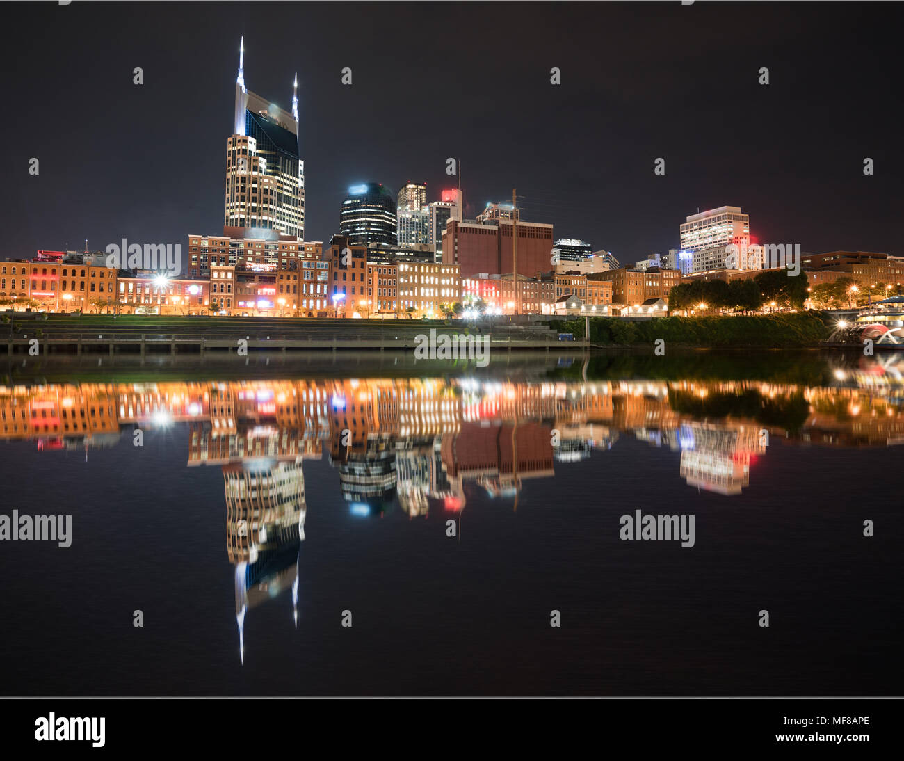 Nashville night skyline reflection along the Cumberland river Stock Photo