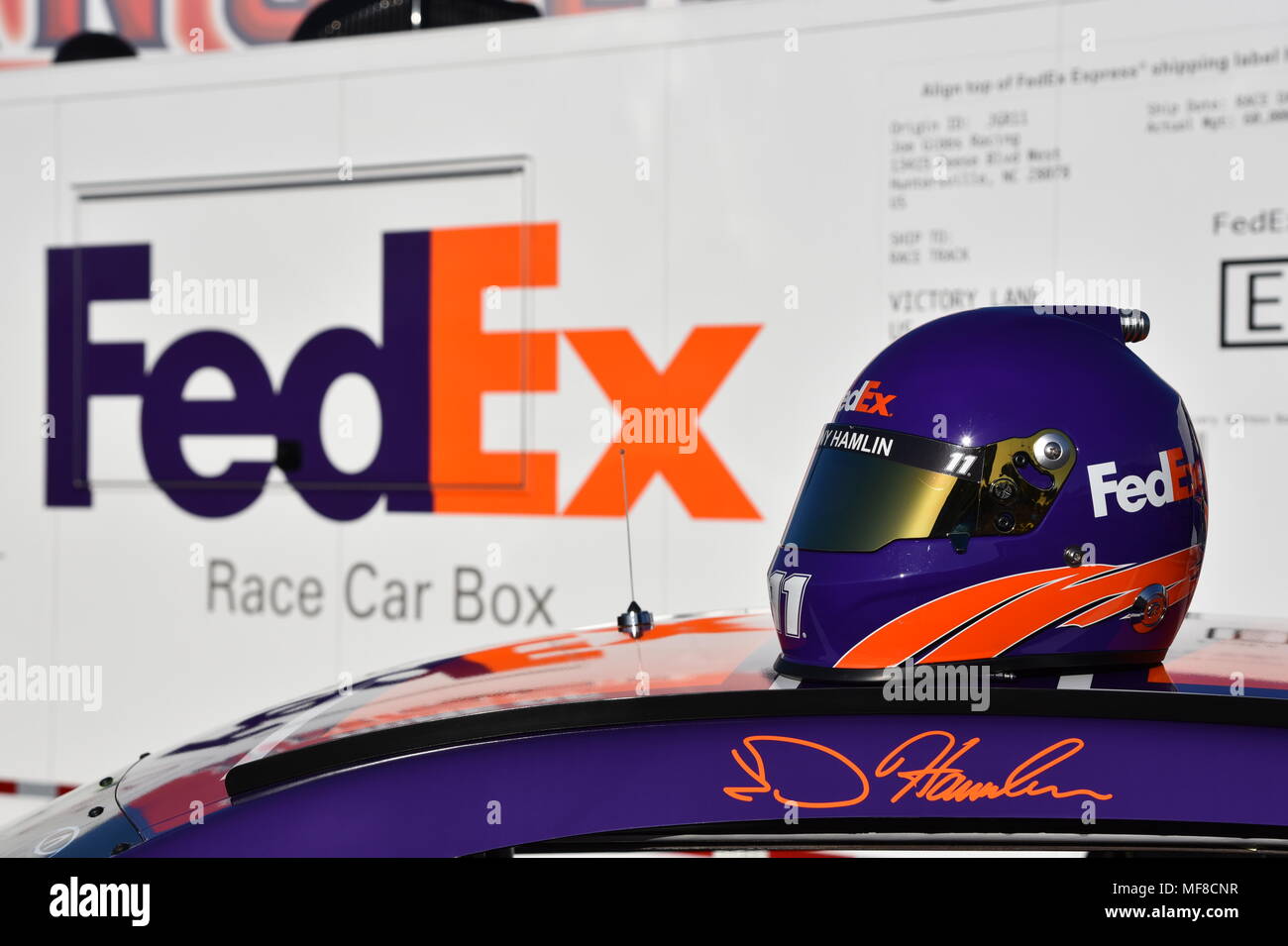 Denny Hamlin helmet on FedEx race car on display at Tempe Arizona on 4/14/18 Stock Photo